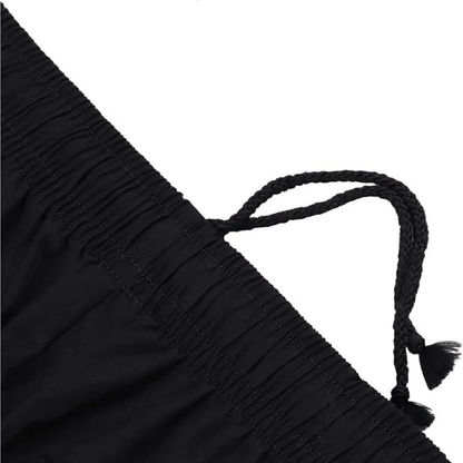 Close look of drawstring of black work trouser