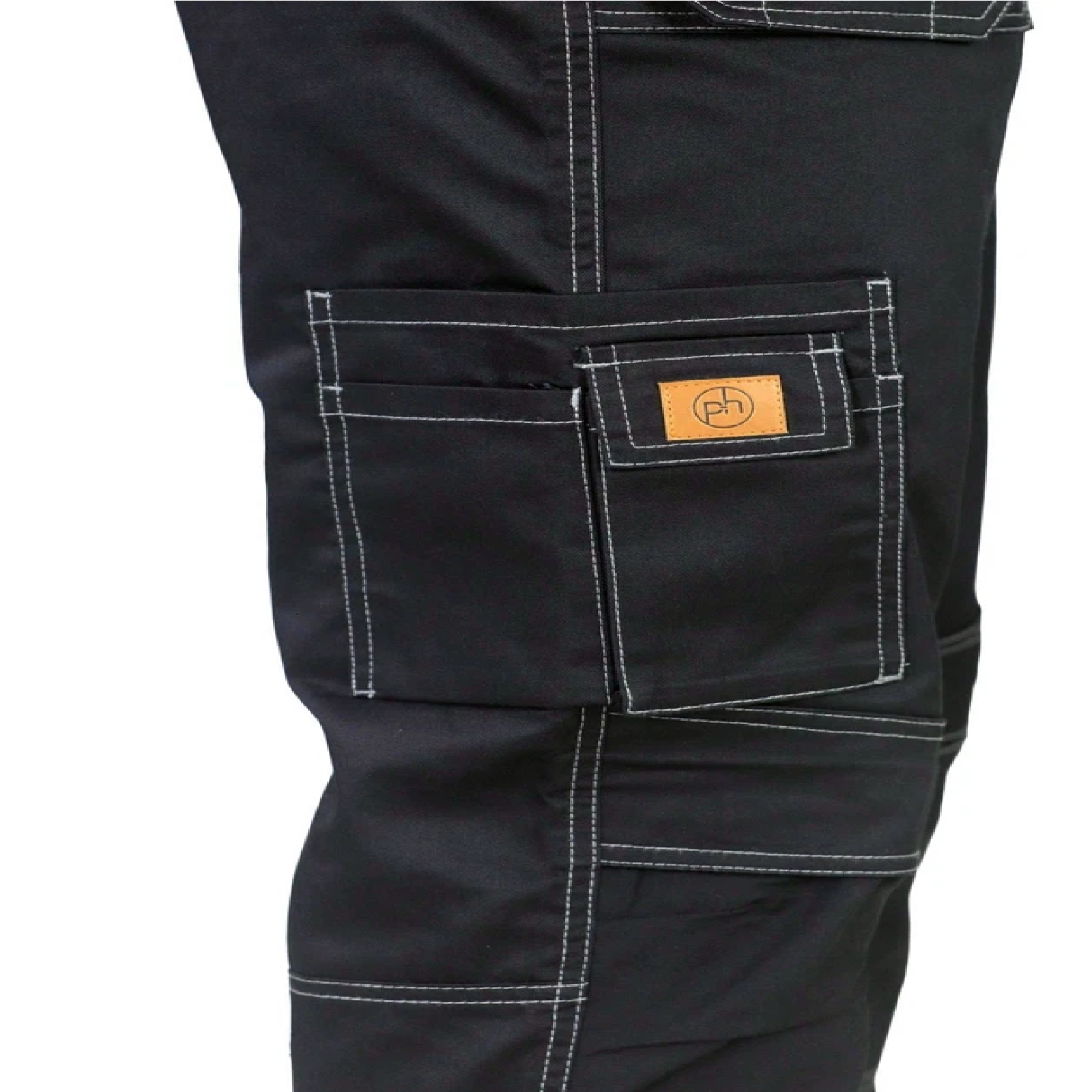 Close-up of black pants with a brand logo on the pocket against a white background