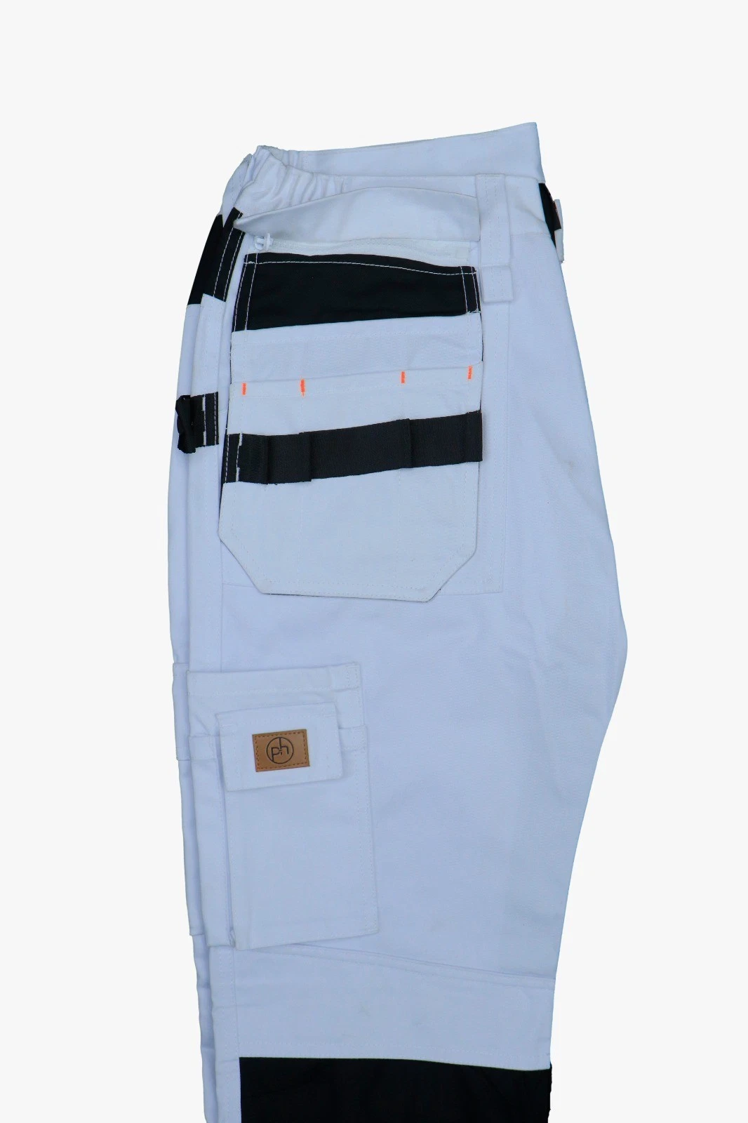 White cargo work trouser with holster  and multiple tool pockets side view