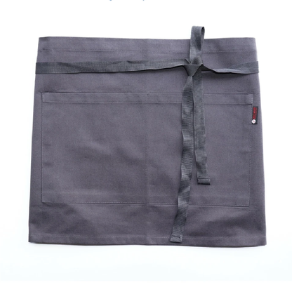 Gray waist apron with pockets on a white background