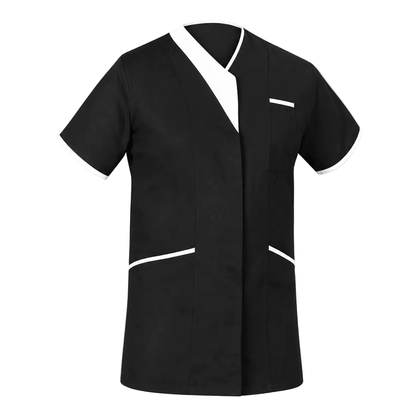 A black short-sleeve scrub top with white contrast trim on the V-neck, sleeve cuffs, chest pocket, and lower front pockets, shown against a light gray background.